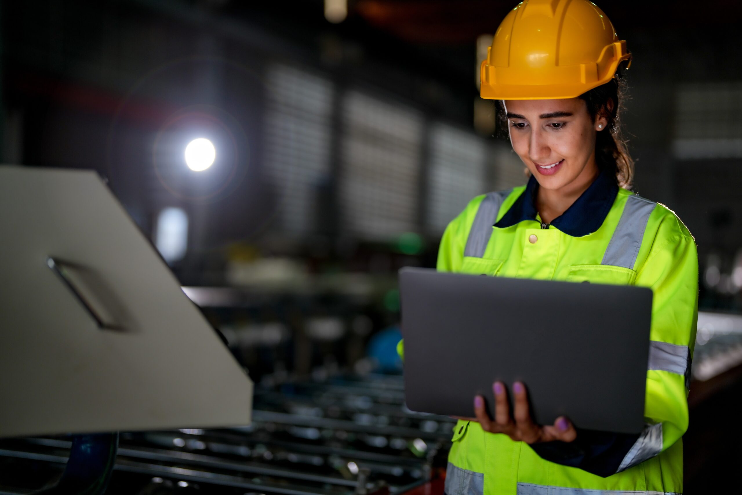Factory,Engineer,Brazilian,Woman,Standing,Confidence,With,Laptop.,Worker,Works